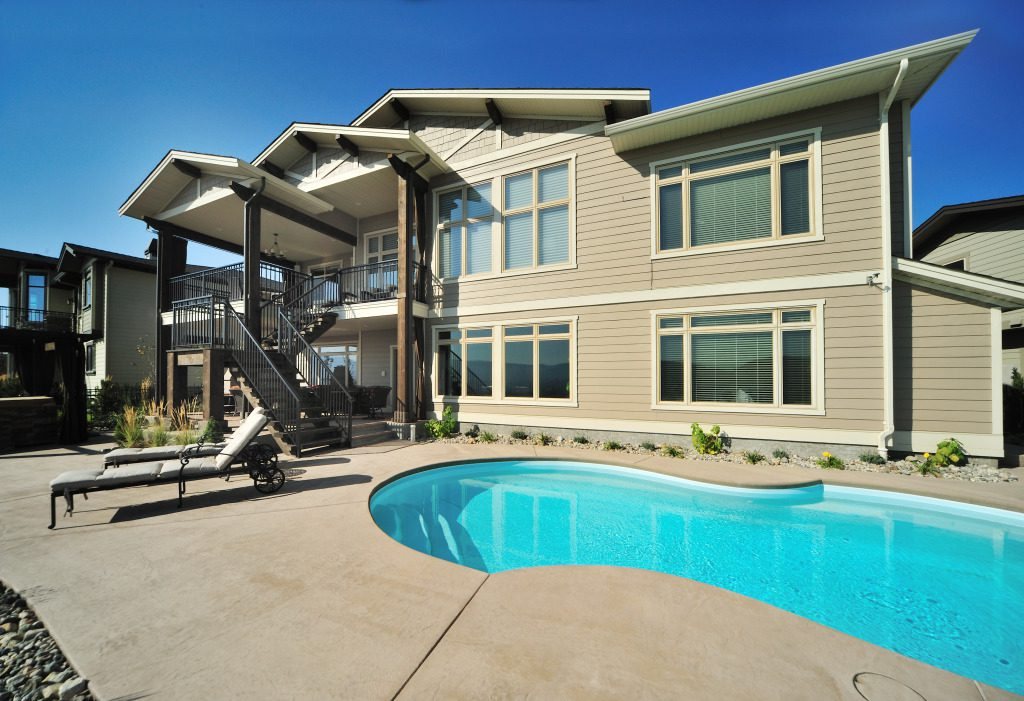 harmony_homes_traditions_cresent_residence_pool_side_view_gallery_image_27